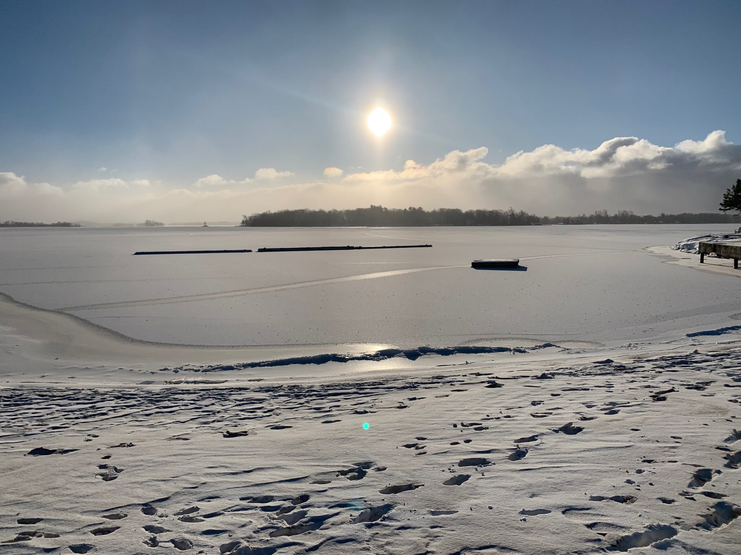 frozen water and snow-covered beach